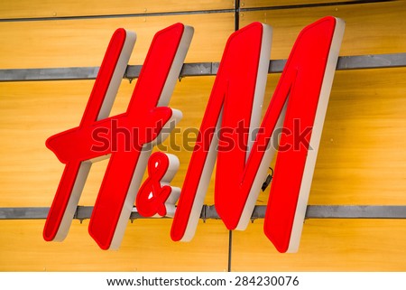 PRAGUE, CZECH REPUBLIC - MAY 24, 2015: H and M, World famous clothing Swedish clothing brand logo, Prague Harfa Gallery. Harfa Gallery is the largest department store and Prague administrative centre.
