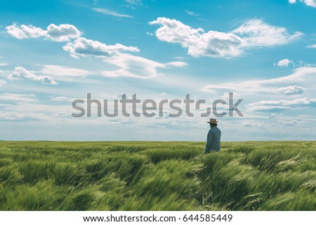 Similar – Image, Stock Photo Crop person with a bunch of fresh asparagus