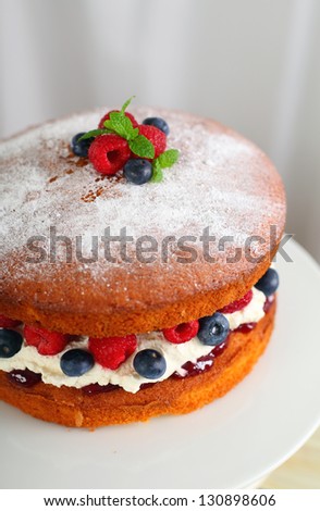 Victoria sponge cake with berries