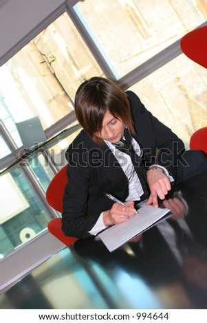 Woman signing contract