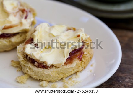 Traditional English cream tea with scones, clotted cream and jam