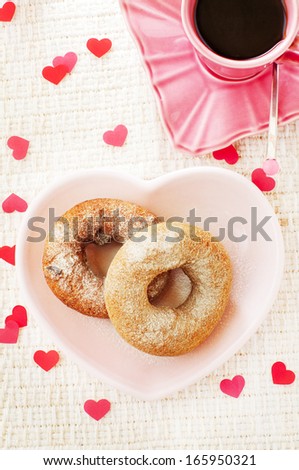 donuts and coffee and many paper hearts
