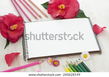 sketch book, flowers and color pencils, mock up