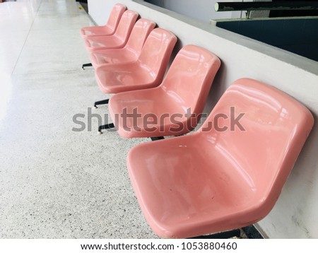 Similar – Image, Stock Photo Pink row of chairs in front of a pink wall