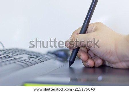 hand on touch pad