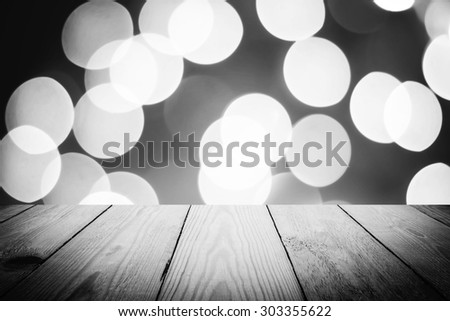 Abstract Black and White bokeh of light and wood background