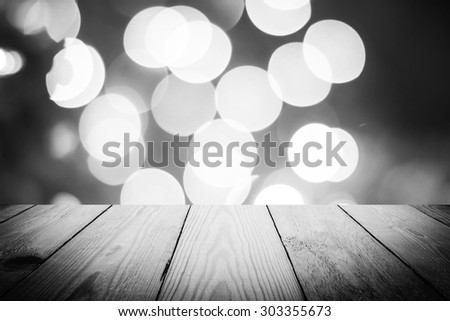 Abstract Black and White bokeh of light and wood background