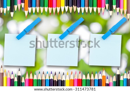 Paper color and wood clip note on Green bokeh with Colour pencils frame