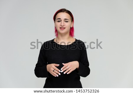 A Beautiful Girl With Naturally Curly Red Hair And Freckles