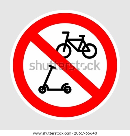 No scooters, no bikes on footpath. The red circle prohibiting sing. Traffic prohibition sign.