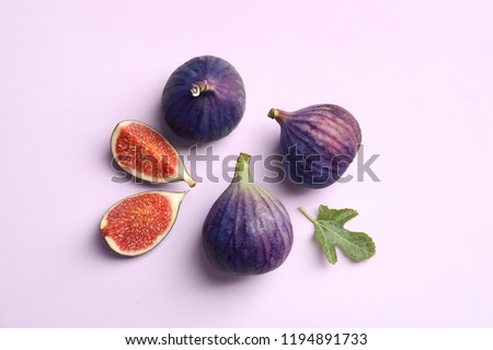 Similar – Ripe figs cut on a pink background. Minimal flat lay.