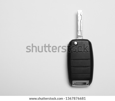 Car key on white background, top view. Space for text