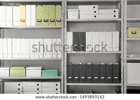 Folders with documents on shelves in archive 商業照片 © 