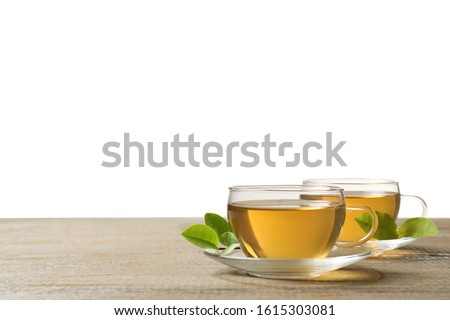 Image, Stock Photo Cups of tasty hot coffee drink on wooden table