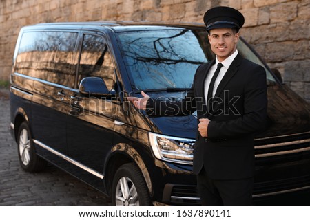 Professional driver near luxury car on street. Chauffeur service ストックフォト © 