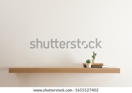 Similar – Image, Stock Photo wooden wall with cactus plants in pots on cupboard,