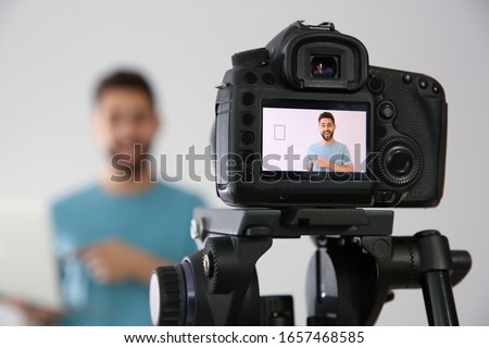 Similar – Image, Stock Photo Fashion blogger recording video at home