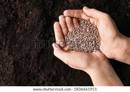 Similar – Image, Stock Photo Female hand with radish in hand in a fruit shop