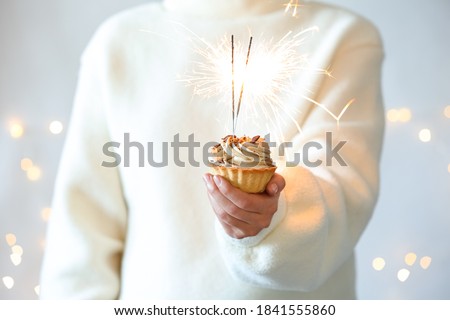 Similar – Image, Stock Photo Sparkler against blurred person in nature