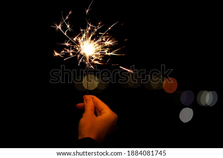 Similar – Image, Stock Photo Sparkler against blurred person in nature