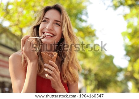 Similar – Image, Stock Photo young woman in cones of light from nocturnal street lighting lanterns