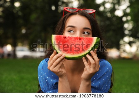 Similar – Image, Stock Photo Woman eating watermelon