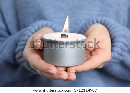 Similar – Image, Stock Photo Woman holding a candle at night, during the Easter celebrations