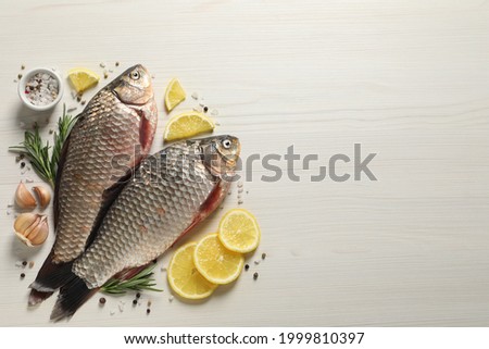 Similar – Image, Stock Photo whole fresh crucian fish with scales