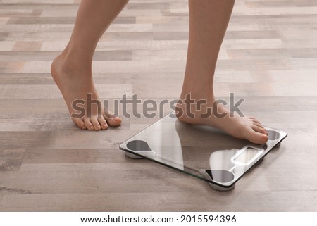 Similar – Image, Stock Photo Barefoot woman standing on beach at sunset