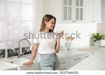 Image, Stock Photo Girl drinking from glass in the evening sun