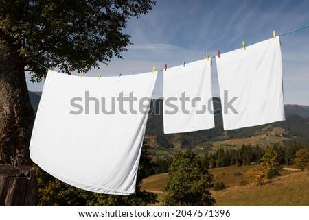 Similar – Image, Stock Photo Fresh and clean white towels on the bed