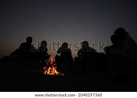 Similar – Foto Bild Feuer am Strand Insel