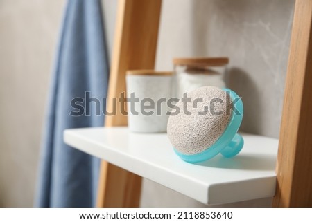 Pumice stone on white shelf in bathroom, space for text ストックフォト © 