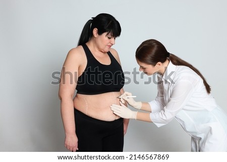 Similar – Image, Stock Photo Woman against the light relaxes after dancing in the dance studio