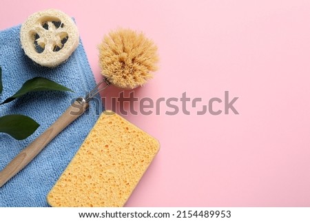 Flat lay composition with sponge and other bath supplies on pink background. Space for text ストックフォト © 
