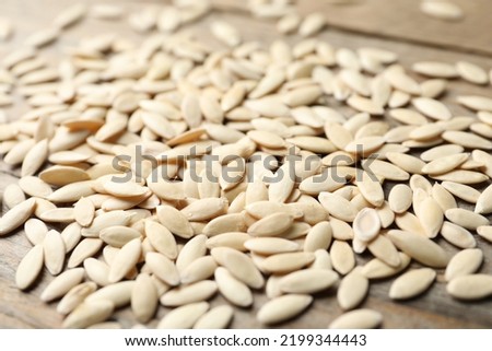 Similar – Image, Stock Photo Cucumber seeds in a female palm. Planting seeds in paper cardboard cup at home, hobby
