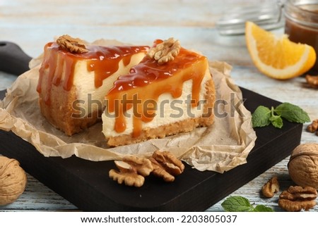 Similar – Foto Bild Käsekuchenscheibe auf blauem Teller. Ein Stück Käsekuchen