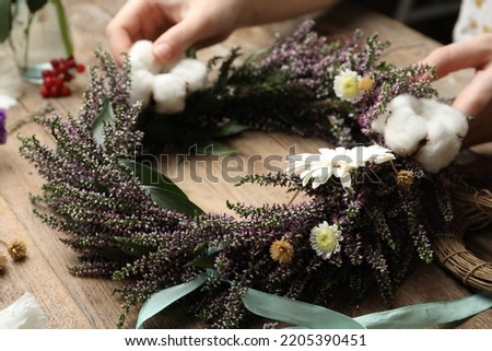Similar – Image, Stock Photo Beautiful autumn wreath or circle frame made with pretty fall leaves, chestnuts, nuts, acorns and flowers on white background. Top view. Flat lay. Creative layout