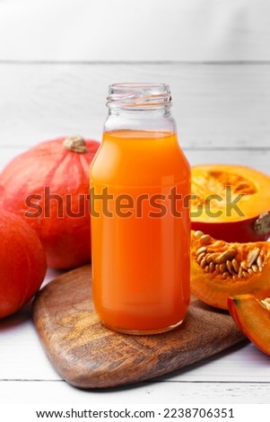 Similar – Image, Stock Photo Fresh pumpkin juice