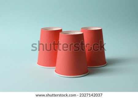 Similar – Image, Stock Photo Paper cup with red drink in the holder of a construction fence