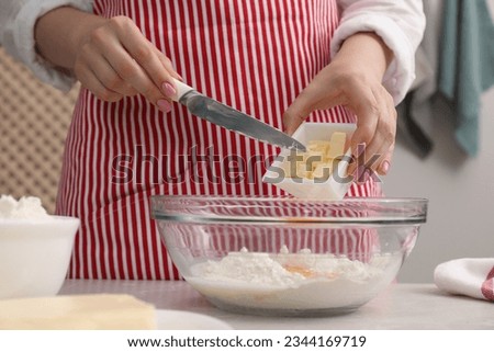 Similar – Image, Stock Photo flour in a bowl and an egg on a white kitchen table