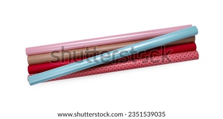 Similar – Image, Stock Photo many colorful paper rolls are stacked on a brown wooden table