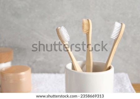 Similar – Image, Stock Photo Bamboo toothbrushes