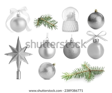 green fir stuff with christmas balls on wooden floor and red painted toes