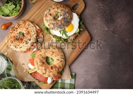 Similar – Image, Stock Photo Vegetable bagel sandwich on wooden table