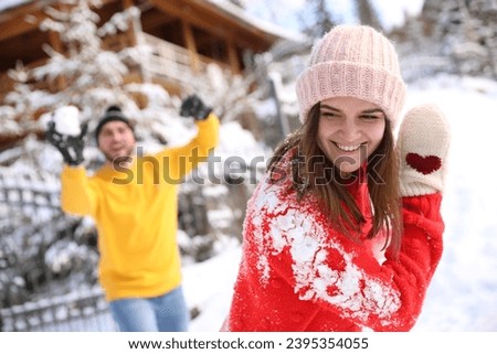 Similar – Image, Stock Photo Woman playing with snow on winter field