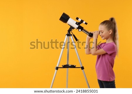 Similar – Image, Stock Photo Child looking through a toy kaleidoscope
