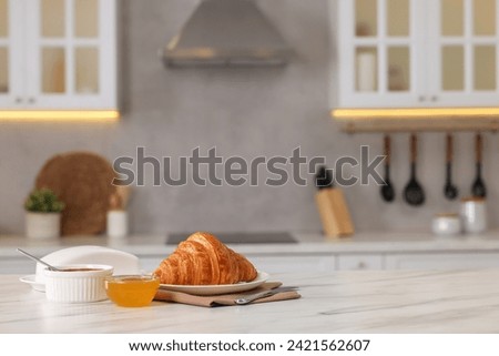 Similar – Image, Stock Photo Breakfast table with a cup of coffee and a slice of bread with butter
