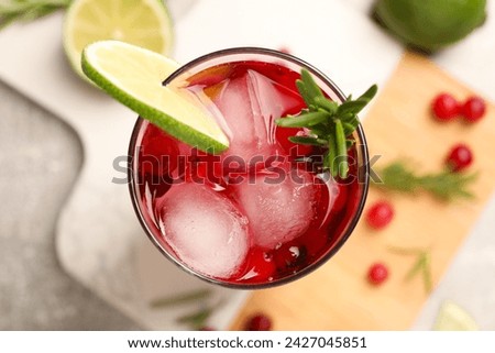 Similar – Image, Stock Photo Delicious red cocktail and barman tools on table