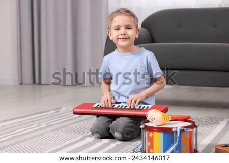 Similar – Image, Stock Photo Boy playing piano at home